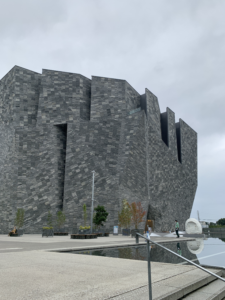 The Kadokawa building; an angular, stately black building in a generally residential area in Saitama.